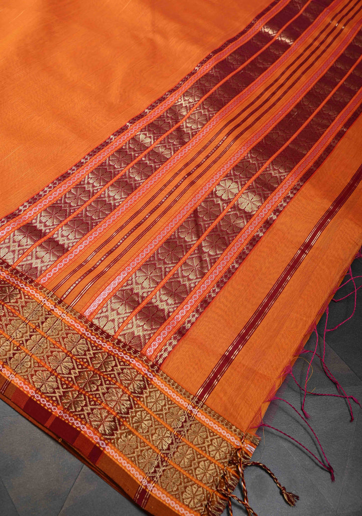 Orange Handwoven Maheshwari Silk Cotton Saree with Muted Stripes and Zari Borders