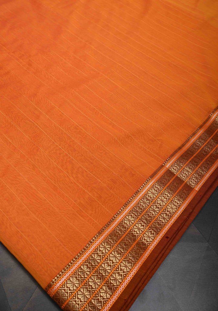 Orange Handwoven Maheshwari Silk Cotton Saree with Muted Stripes and Zari Borders