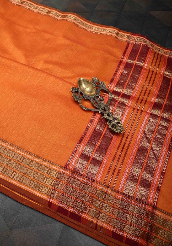 Orange Handwoven Maheshwari Silk Cotton Saree with Muted Stripes and Zari Borders