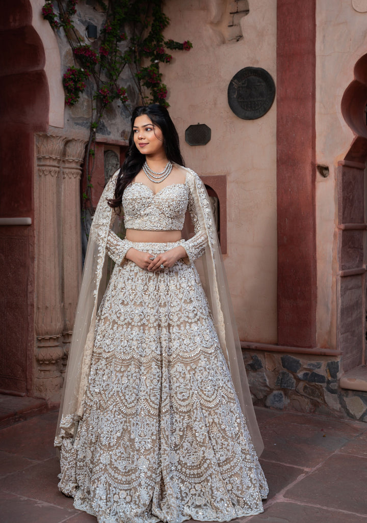 Decadent Ivory Lehenga with pearls and hand-embroidery in Net, Customizable, Made to Order