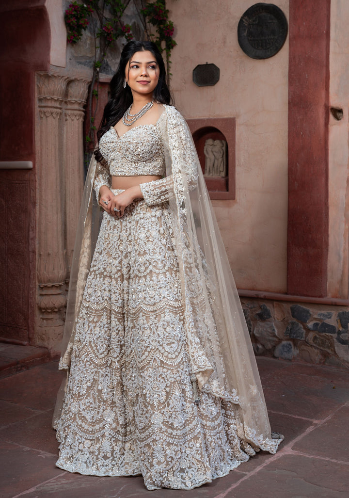 Decadent Ivory Lehenga with pearls and hand-embroidery in Net, Customizable, Made to Order