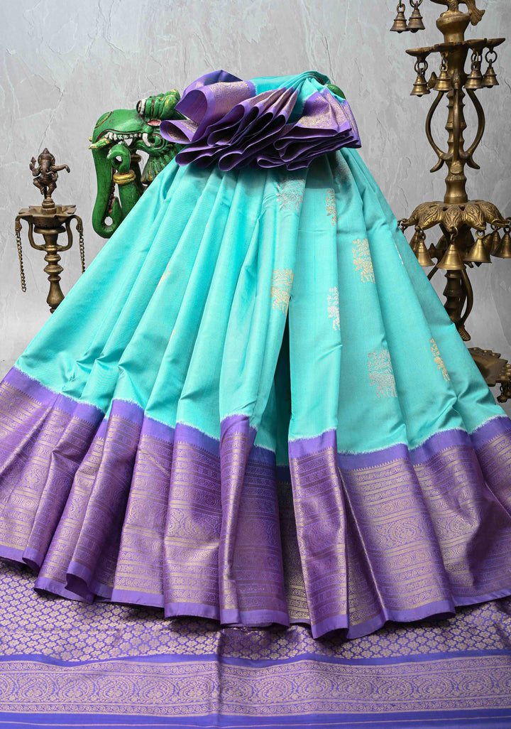 Aqua Blue Ikkat Kanjivaram Fusion Silk Saree with Gold-Silver Buttas and Contrast Zari Border | SILK MARK CERTIFIED