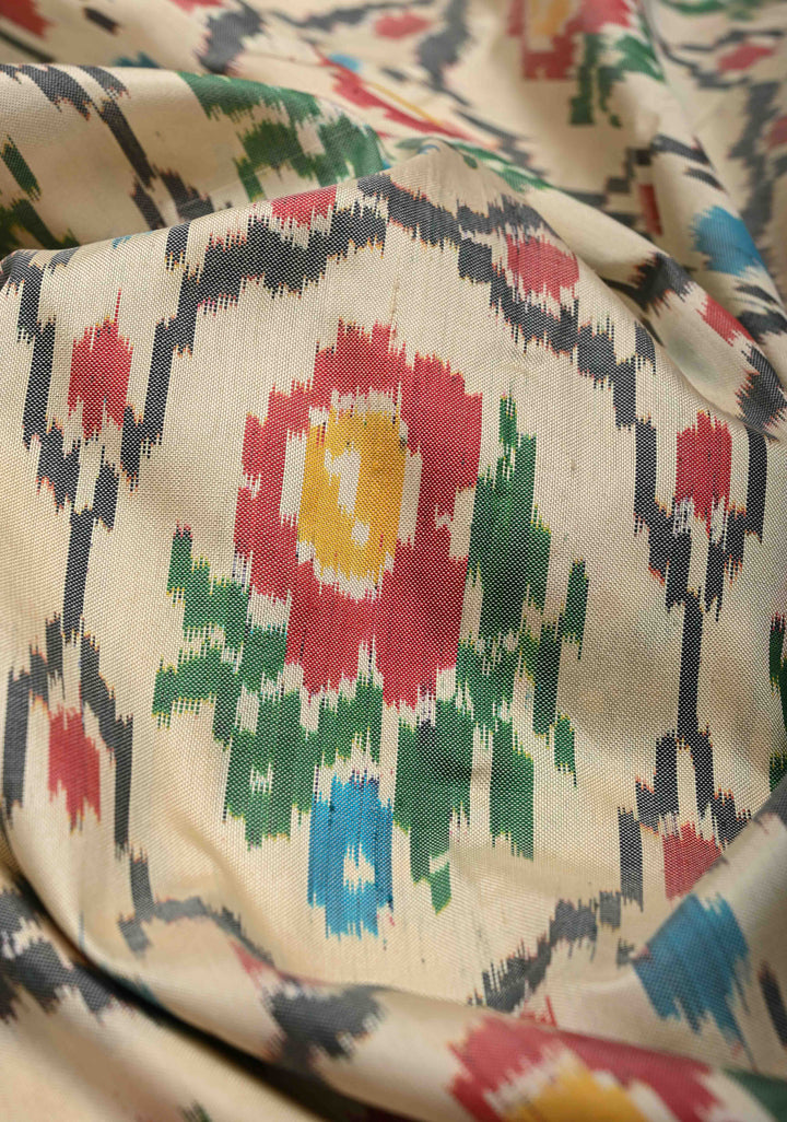 Beige Ikkat Pure Silk Saree with Intricate Floral weave and Contrast Border | SILK MARK CERTIFIED