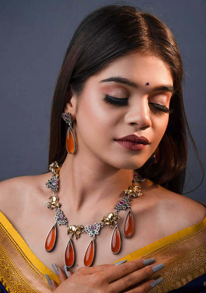 Fusion Dual Tone Jewelry with Pichwai Cow Units and burnt orange Stones | Shobitam Jewelry