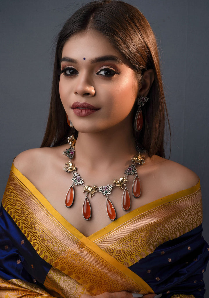 Fusion Dual Tone Jewelry with Pichwai Cow Units and burnt orange Stones | Shobitam Jewelry