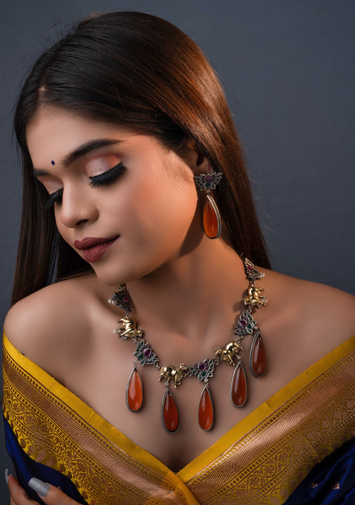 Fusion Dual Tone Jewelry with Pichwai Cow Units and burnt orange Stones | Shobitam Jewelry