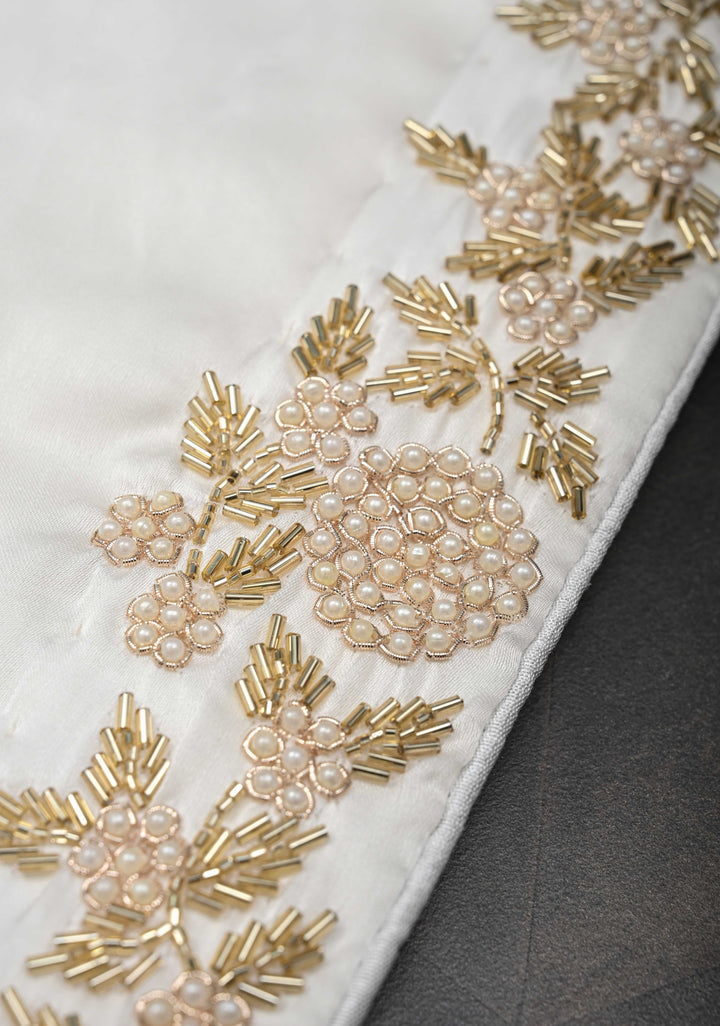 Ivory satin georgette Saree with sequins and Moti work Buttas and Boder