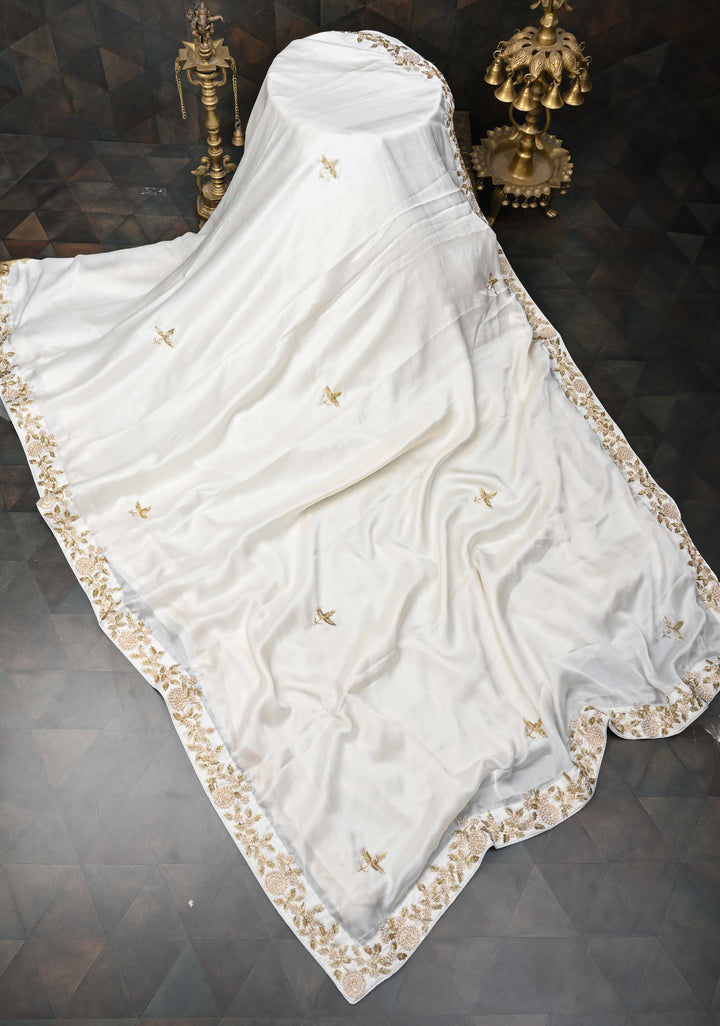Ivory satin georgette Saree with sequins and Moti work Buttas and Boder