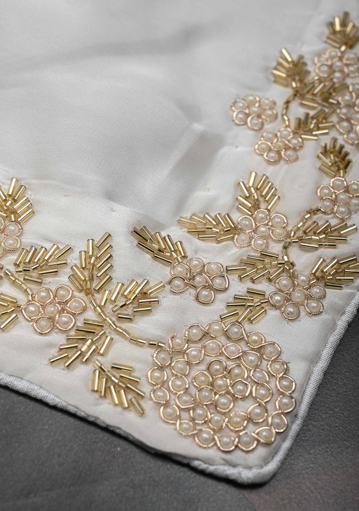 Ivory satin georgette Saree with sequins and Moti work Buttas and Boder