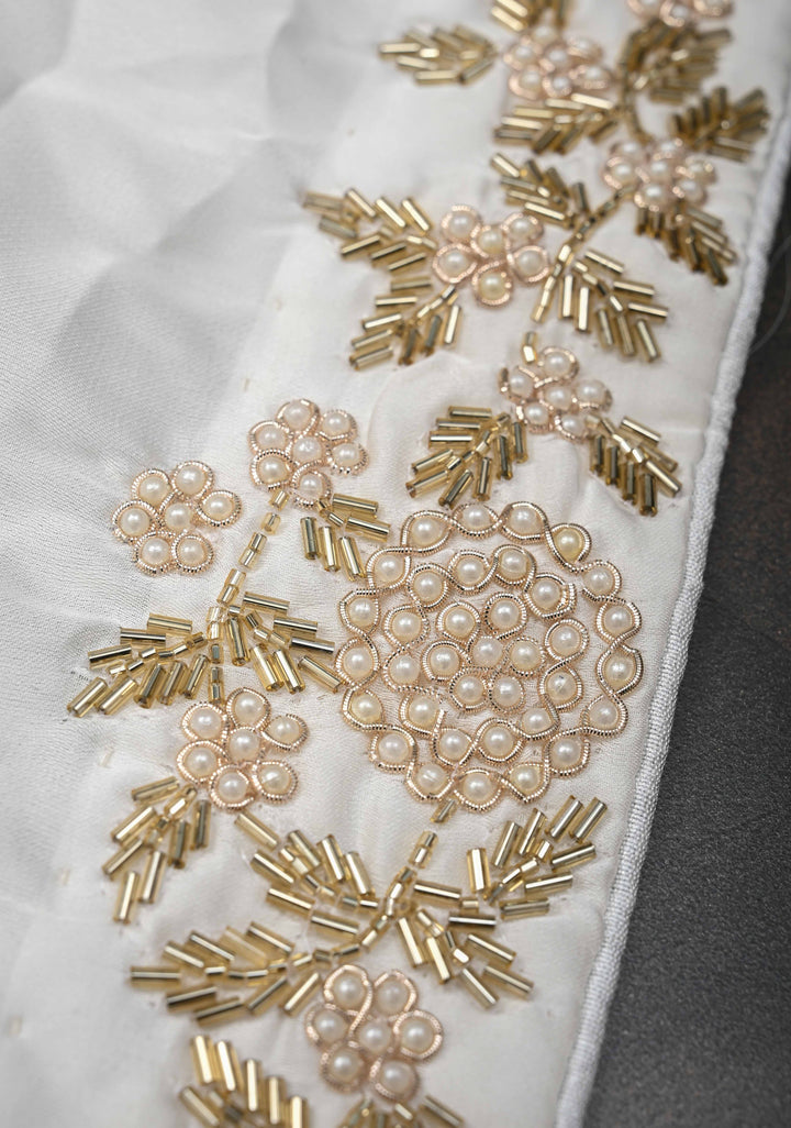 Ivory satin georgette Saree with sequins and Moti work Buttas and Boder