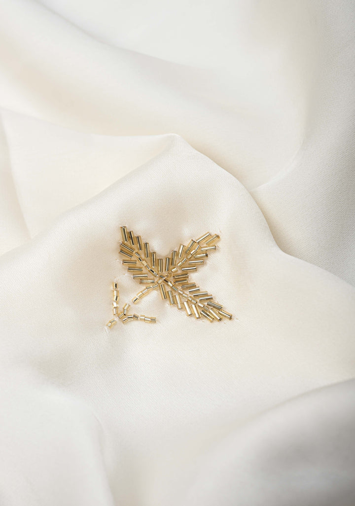 Ivory satin georgette Saree with sequins and Moti work Buttas and Boder