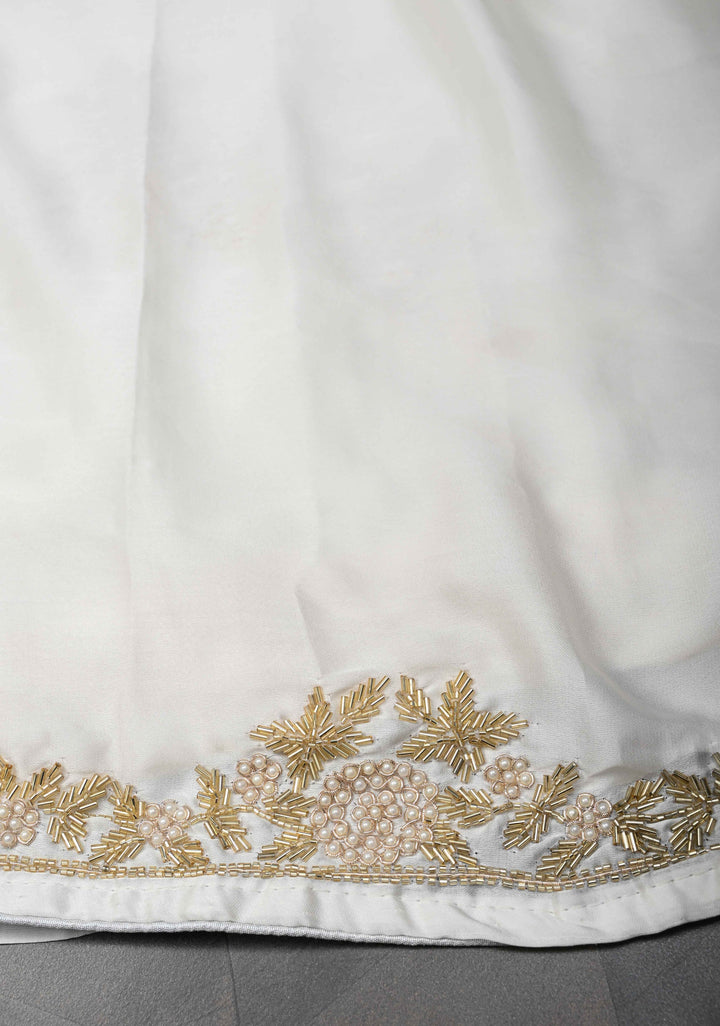 Ivory satin georgette Saree with sequins and Moti work Buttas and Boder