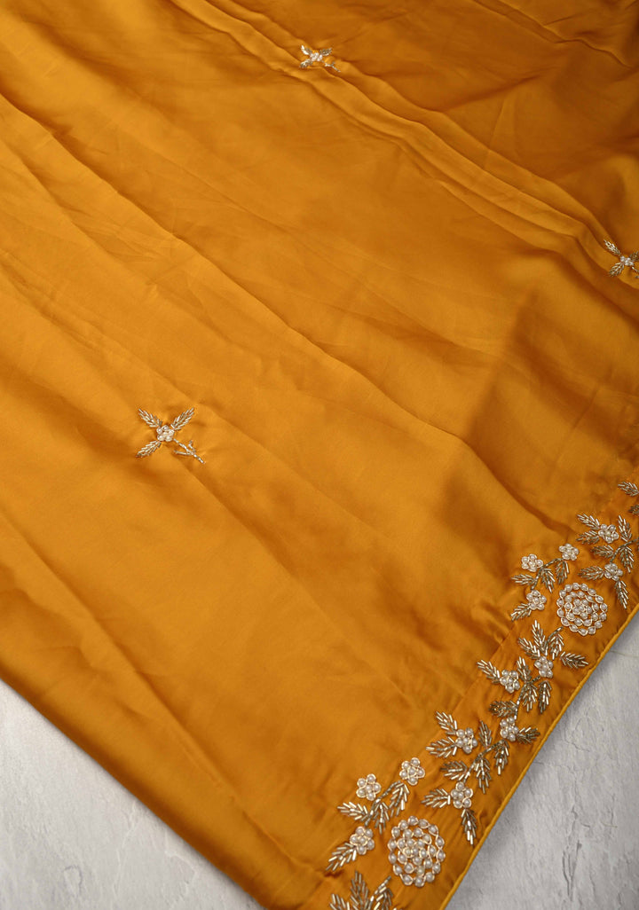Mustard Yellow  Satin Georgette saree with moti, cutdana and Zardozi embellishments