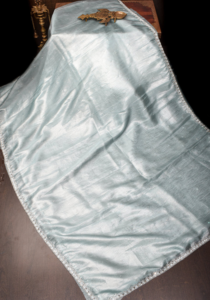 Powder Blue Tissue Saree with sequins, cutdana, mirror work and scalloped Borders