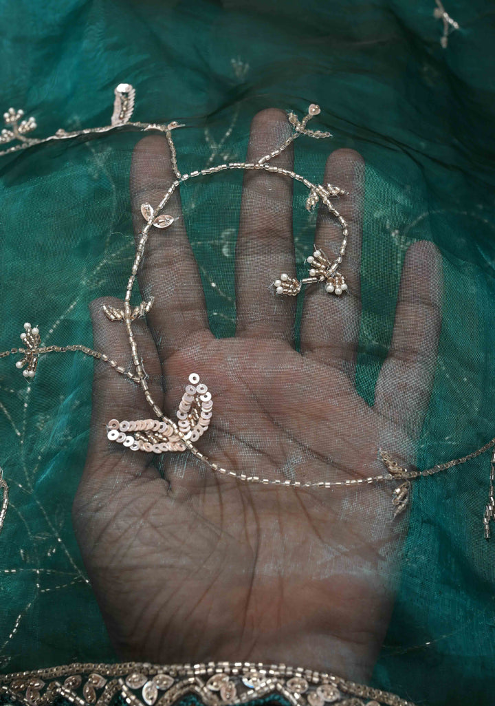 Peacock Green Organza Saree with sequins, cutdana, Moti Machine Embroidery and Scallop Border