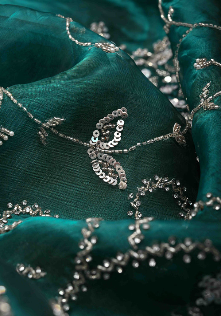 Peacock Green Organza Saree with sequins, cutdana, Moti Machine Embroidery and Scallop Border