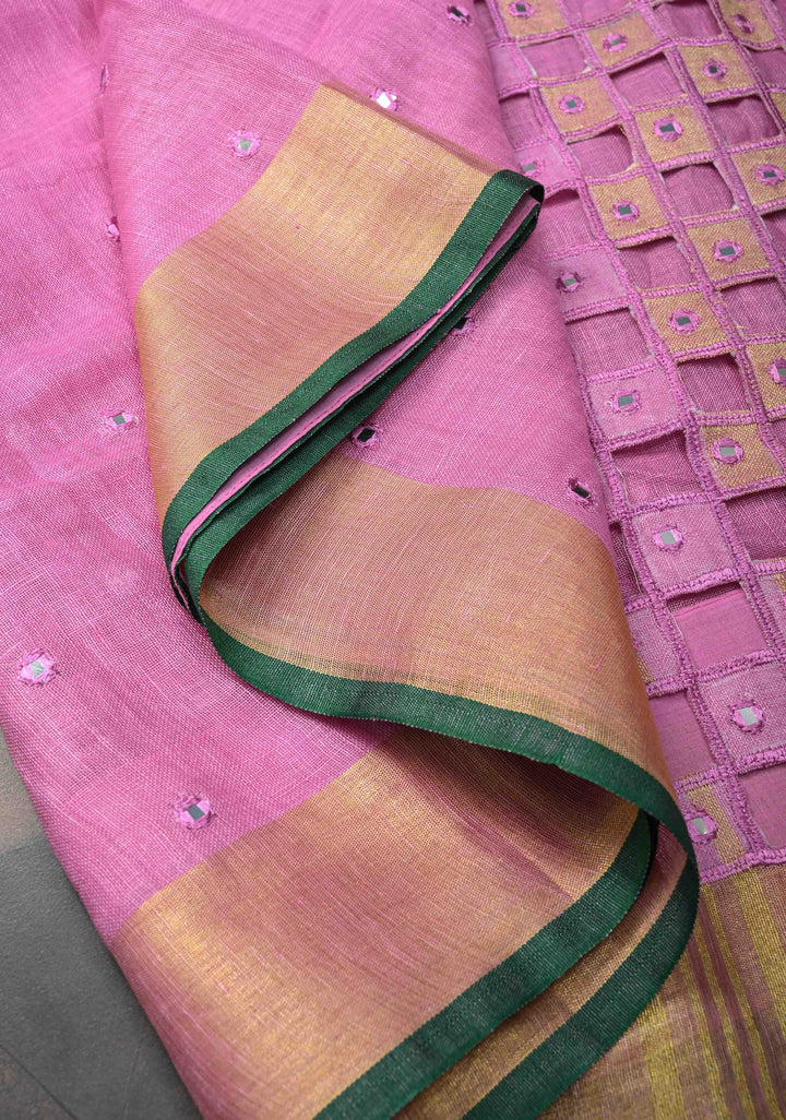 Jaali Pallu - Linen by Linen Cutwork and Mirrorwork Saree in Pink and Zari Border