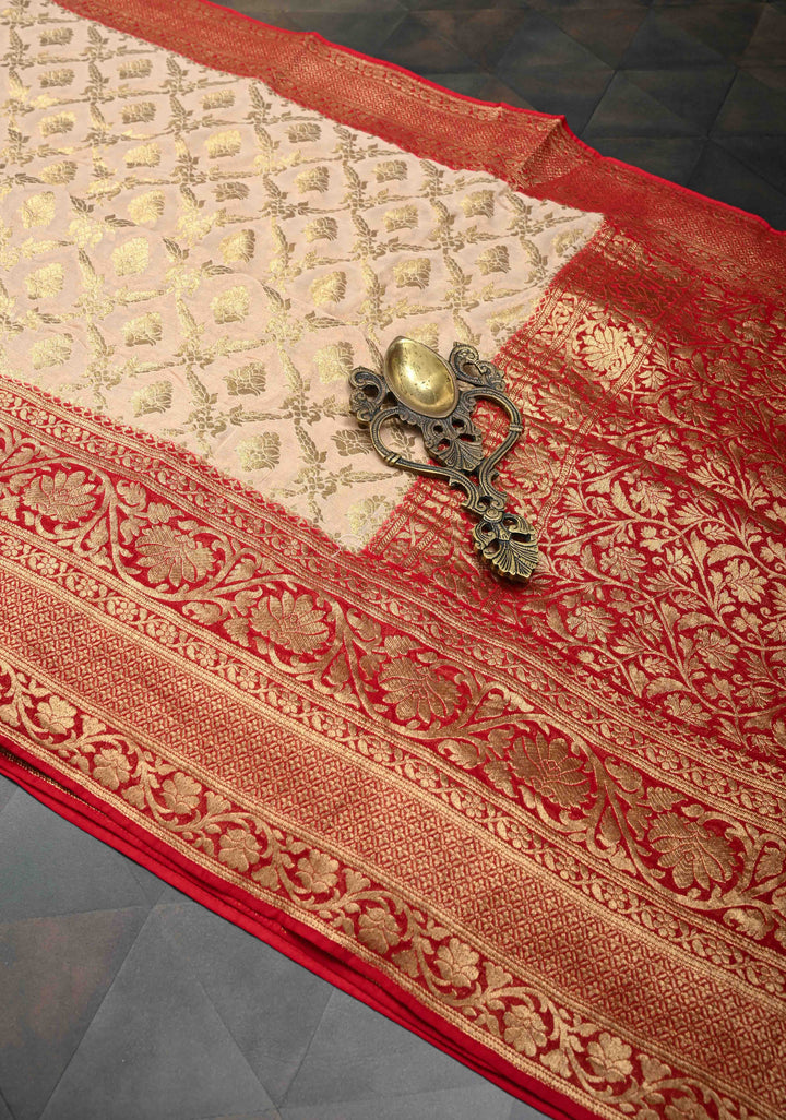 Beige Georgette Silk Banarasi Floral Jaal Saree with Contrast Red Zari Border