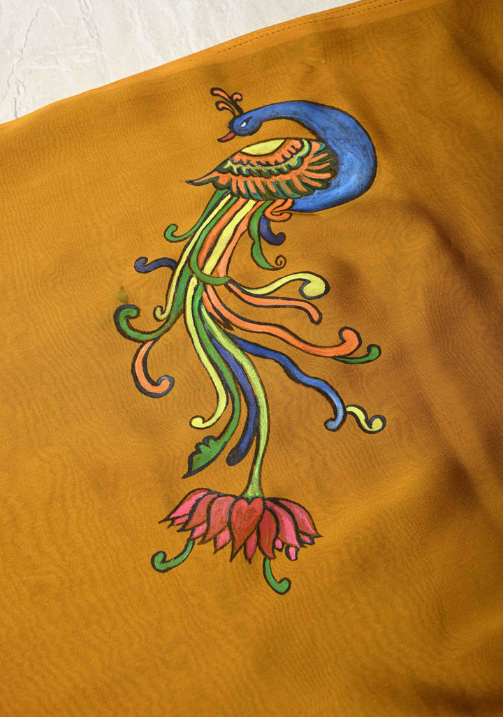 Ochre yellow on Shimmer Georgette Saree with Hand paint Peacock Motifs