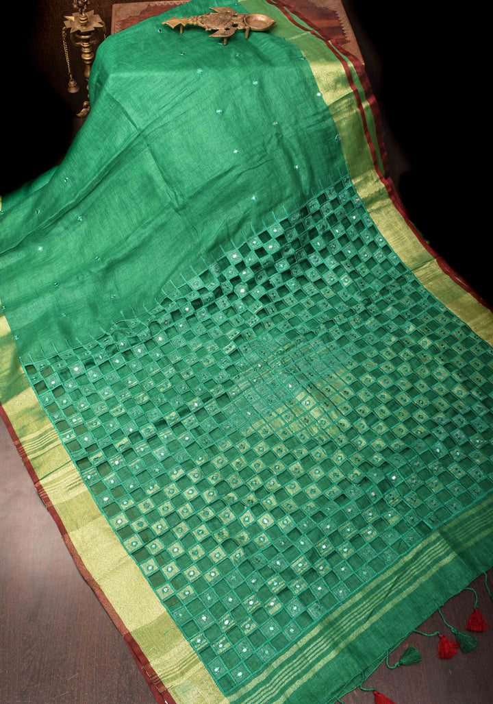 Jaali Pallu - Linen by Linen Cutwork and Mirrorwork Saree in Green
