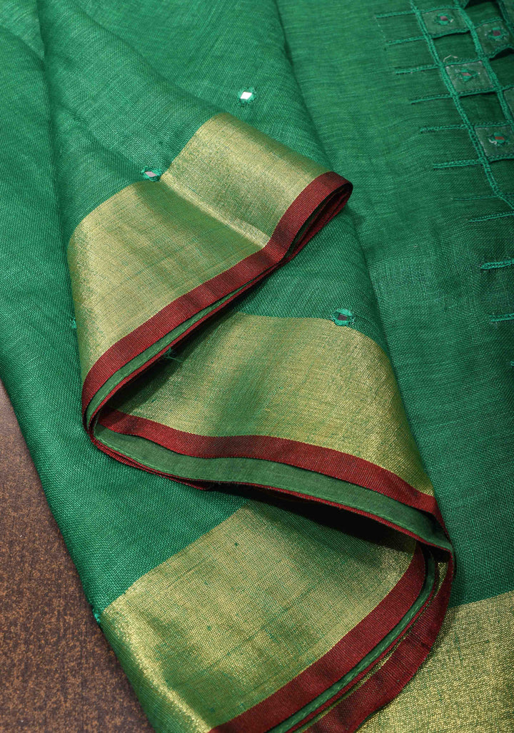 Jaali Pallu - Linen by Linen Cutwork and Mirrorwork Saree in Green