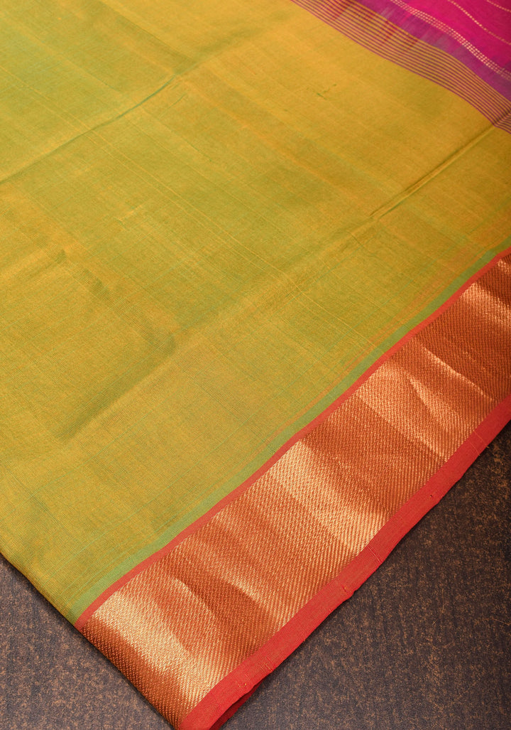 Kanchi Silk Cotton in Dual tone Green and Yellow with Zari Border