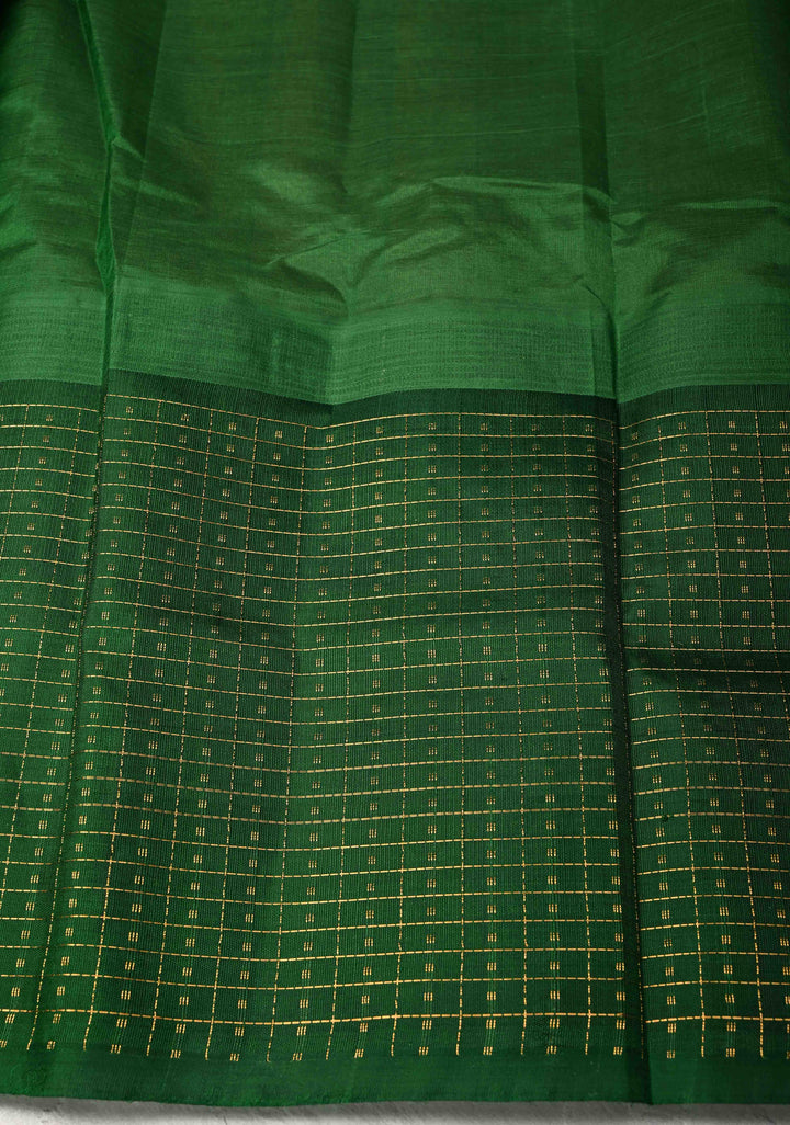 Sandstone Kanchi Silk Cotton Saree with contrast zari checks and Butta Green Border
