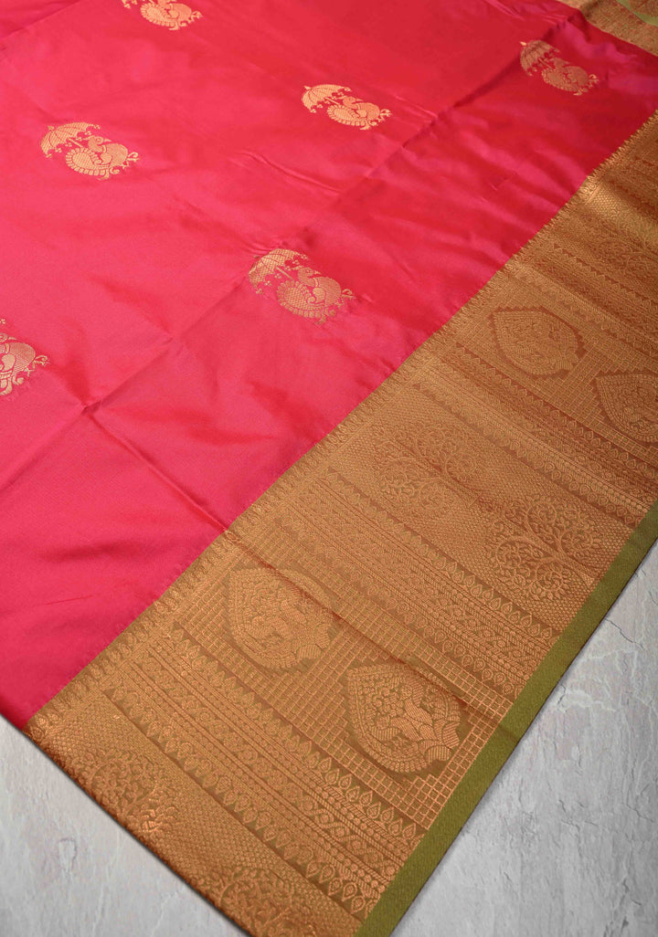 Rani Pink Kanchi Semi Silk Saree with Peacock Buttas and Contrast Zari Border