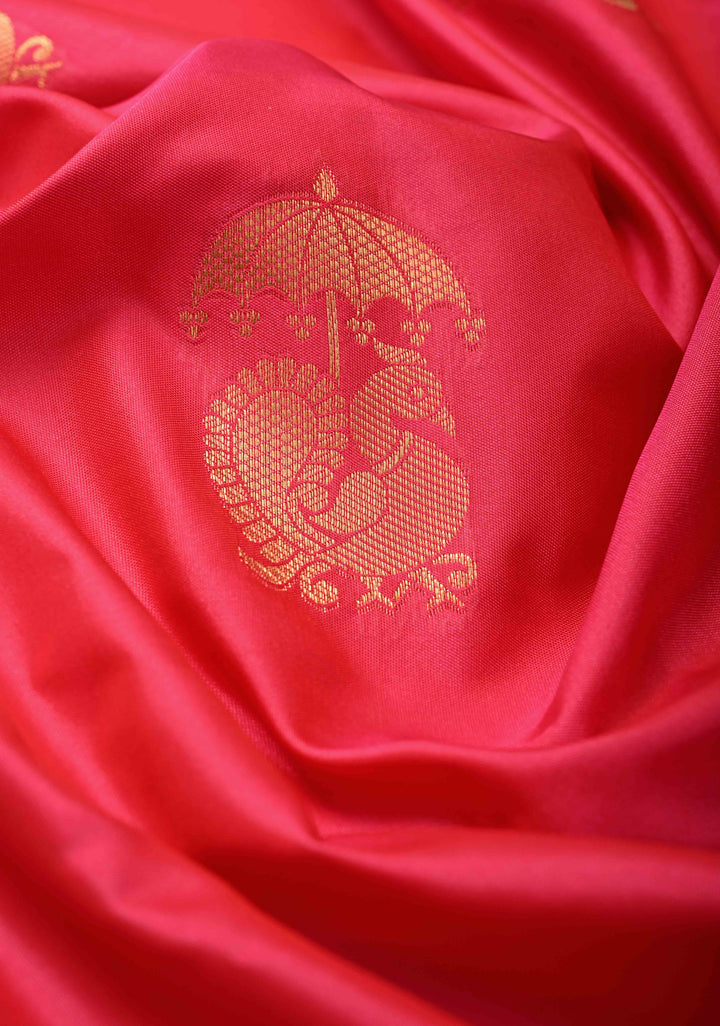 Rani Pink Kanchi Semi Silk Saree with Peacock Buttas and Contrast Zari Border