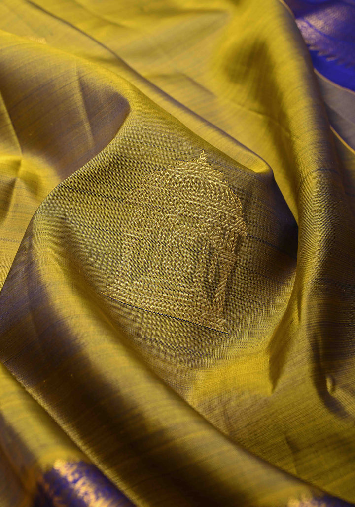 1 Gram Gold Zari Moss Green-Purple Dual tone Pure Kanjivaram Silk Saree with Arch Motifs and Wide Zari Border | SILK MARK CERTIFIED