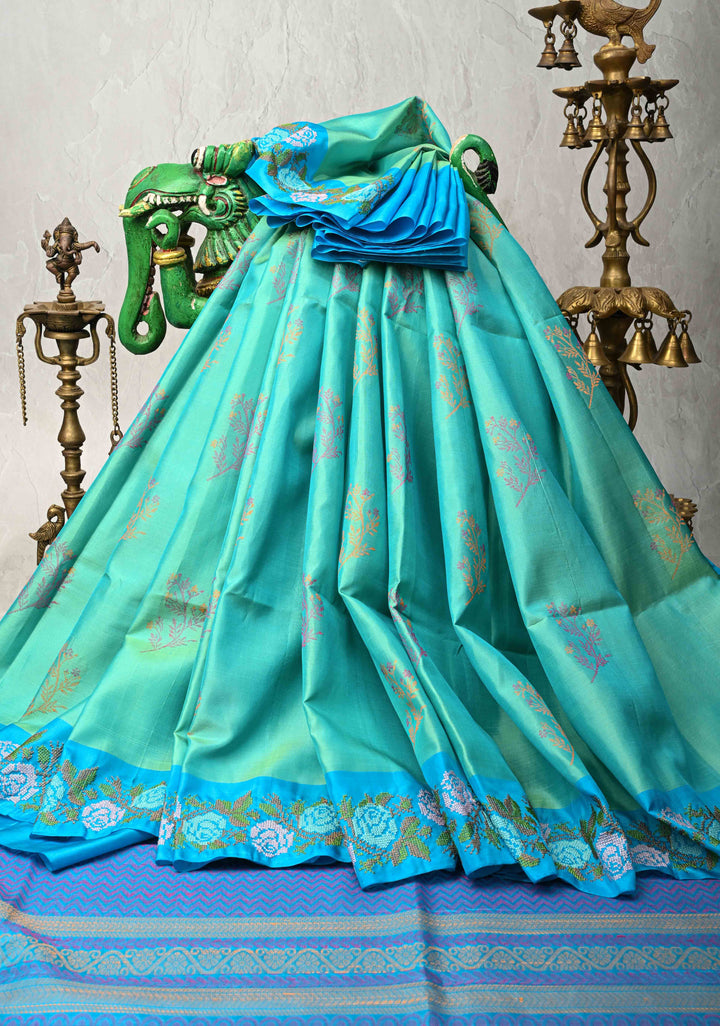 Sea Green Dual tone Kanjivaram Soft Silk Saree with Resham Weave Buttas and Cross Stitch Machine Embroidery Border | SILK MARK CERTIFIED