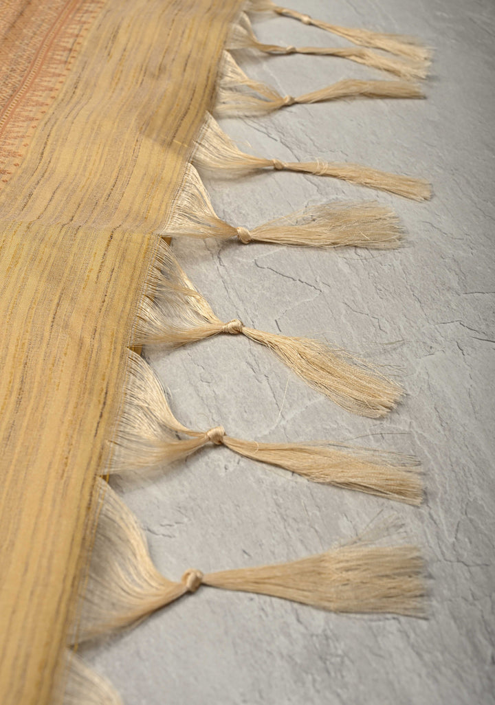 Muted Yellow Kanchi Semi Silk Saree with Meenakari  Buttas and Multicolor Temple Border