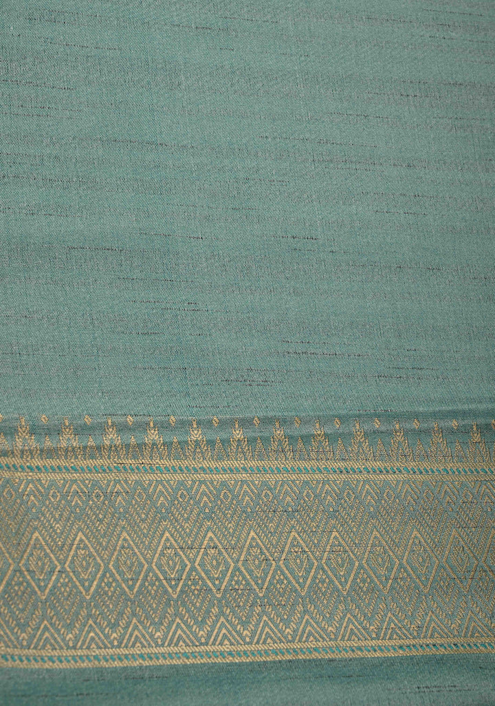 Sage Green Kanchi Semi Silk Saree with Meenakari  Buttas and Multicolor Temple Border