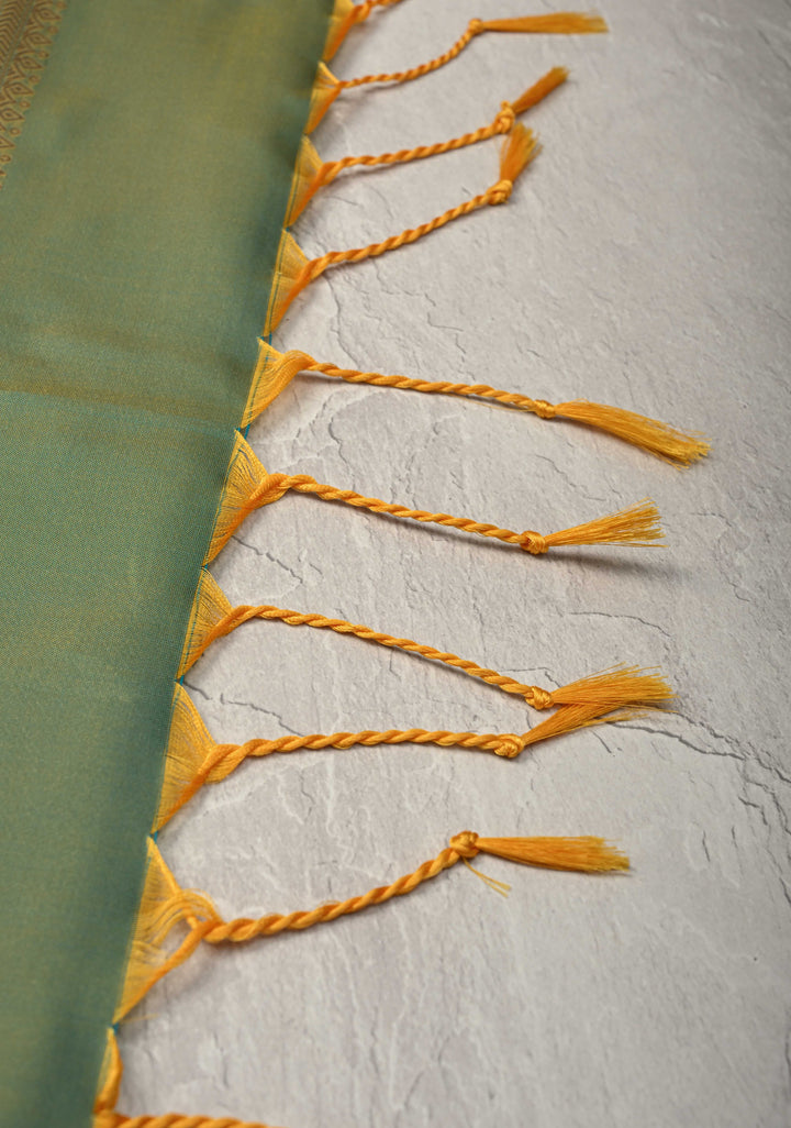 Orange Kanchi Semi Silk Saree with Paisley Zari Buttas and Geomatric Motifs on Border