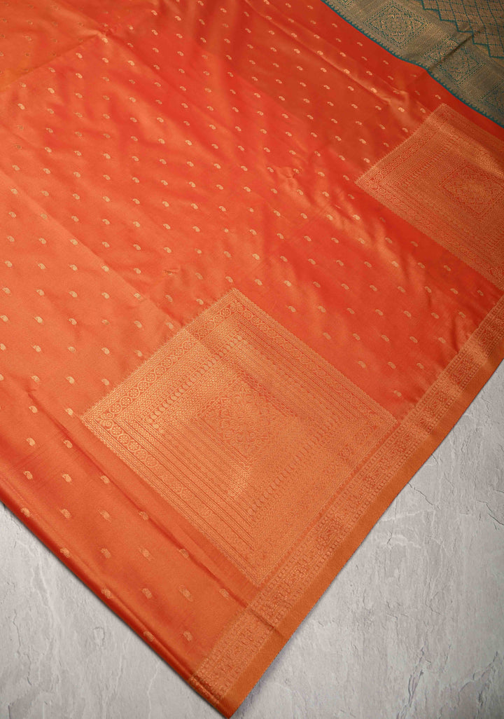 Orange Kanchi Semi Silk Saree with Paisley Zari Buttas and Geomatric Motifs on Border