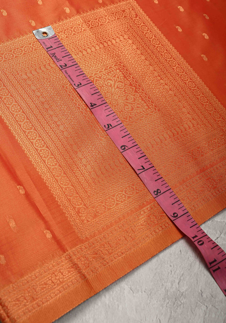 Orange Kanchi Semi Silk Saree with Paisley Zari Buttas and Geomatric Motifs on Border