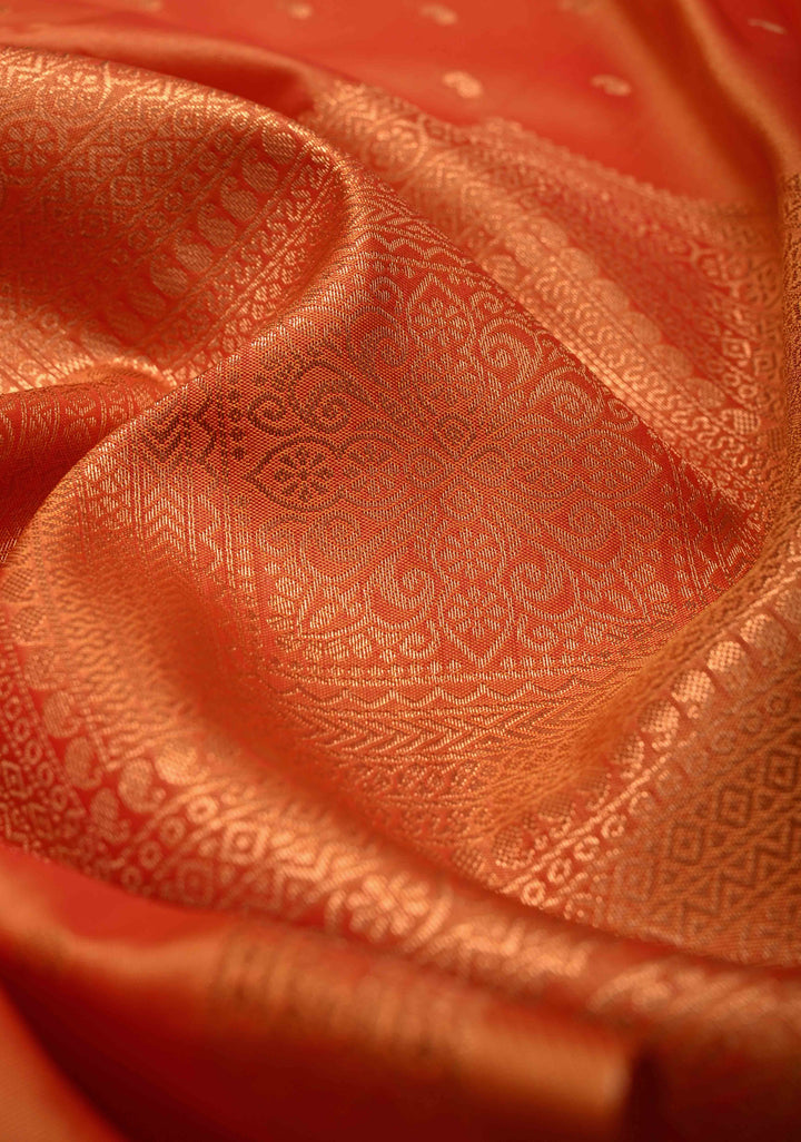 Orange Kanchi Semi Silk Saree with Paisley Zari Buttas and Geomatric Motifs on Border