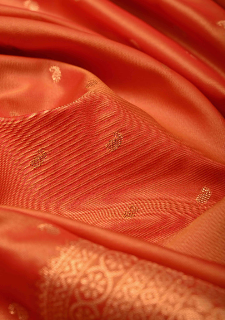 Orange Kanchi Semi Silk Saree with Paisley Zari Buttas and Geomatric Motifs on Border