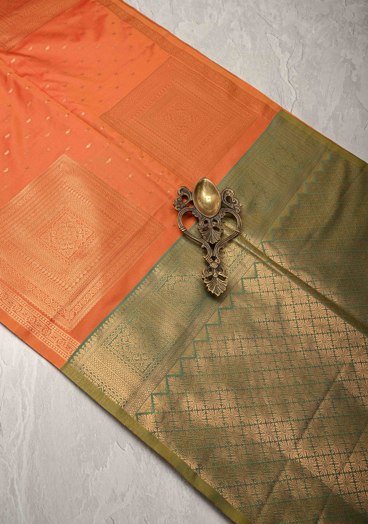 Orange Kanchi Semi Silk Saree with Paisley Zari Buttas and Geomatric Motifs on Border