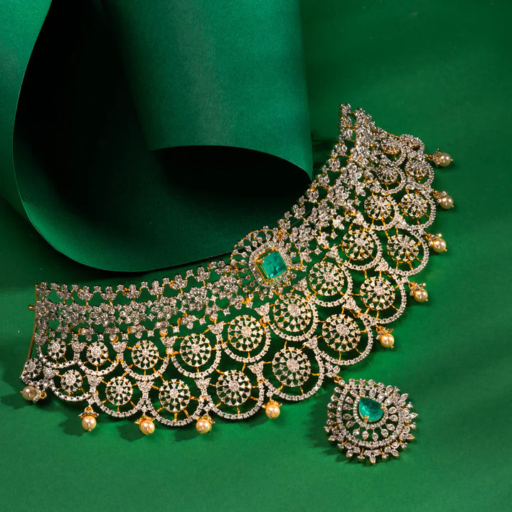 92.5 Silver, Gold Plated CZ stones and a stunning pop-up Emerald centre Surya Chakra Choker Set