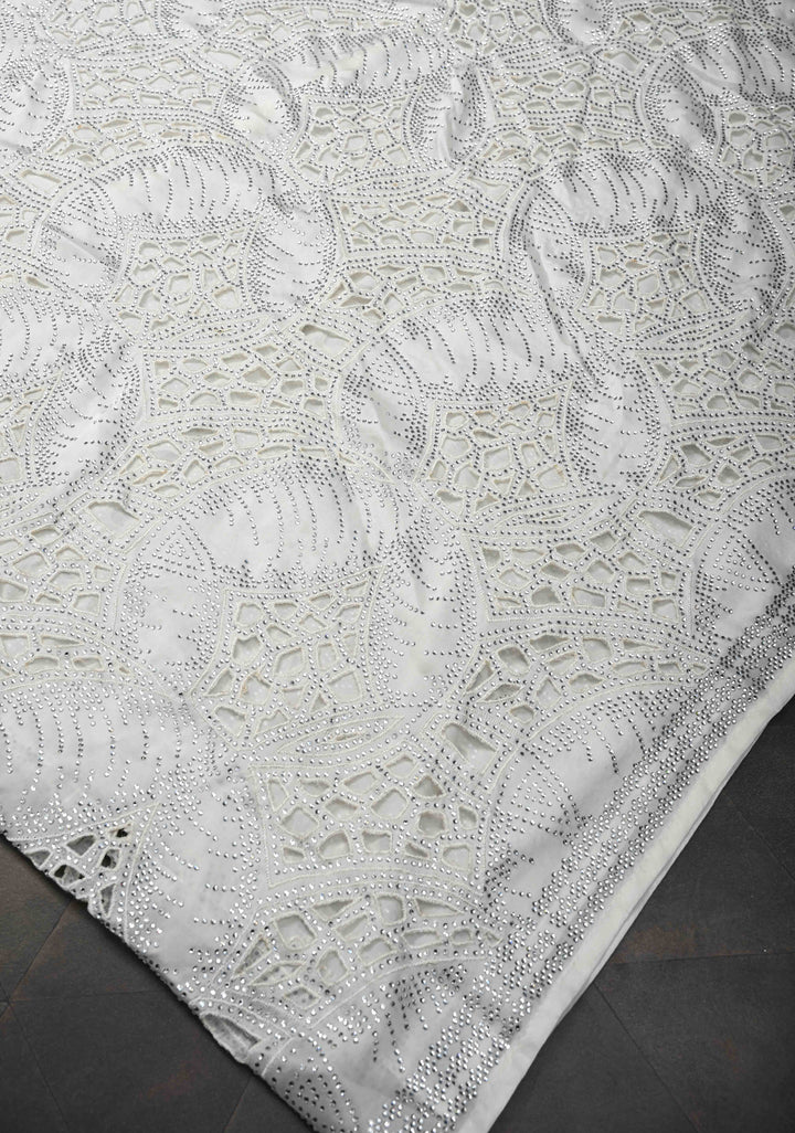 Ivory Satin Machine Cutwork Saree and Tone on Tone Powder Stones work