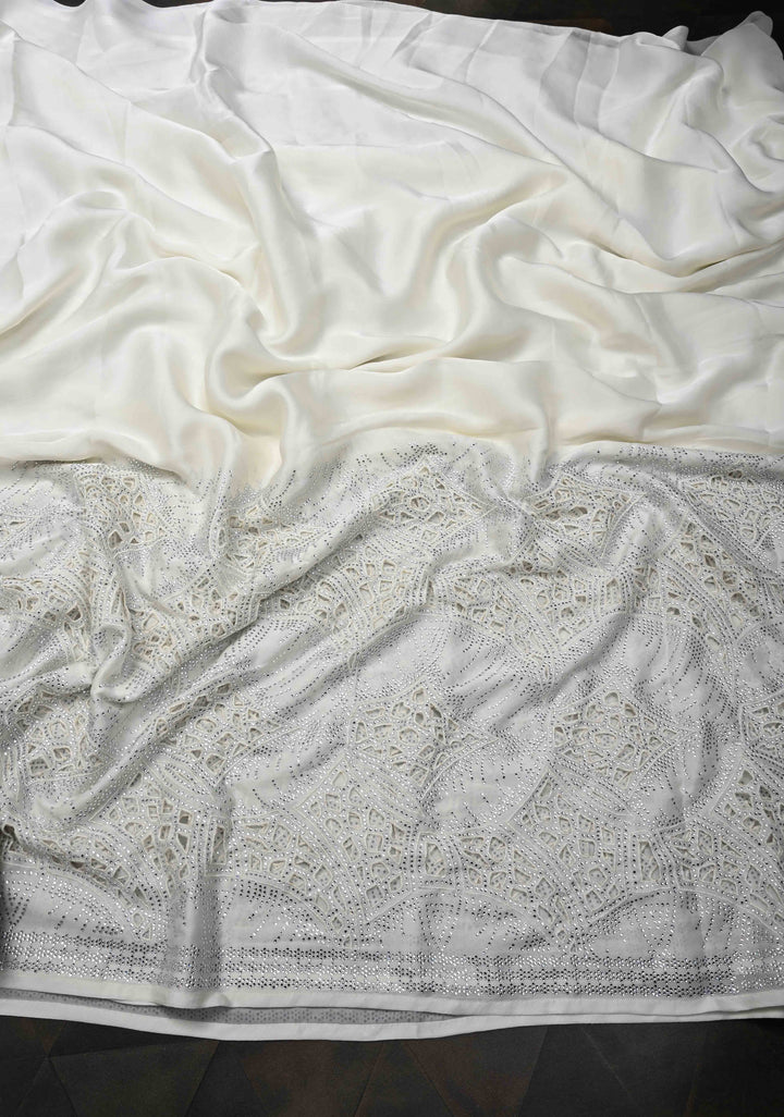 Ivory Satin Machine Cutwork Saree and Tone on Tone Powder Stones work