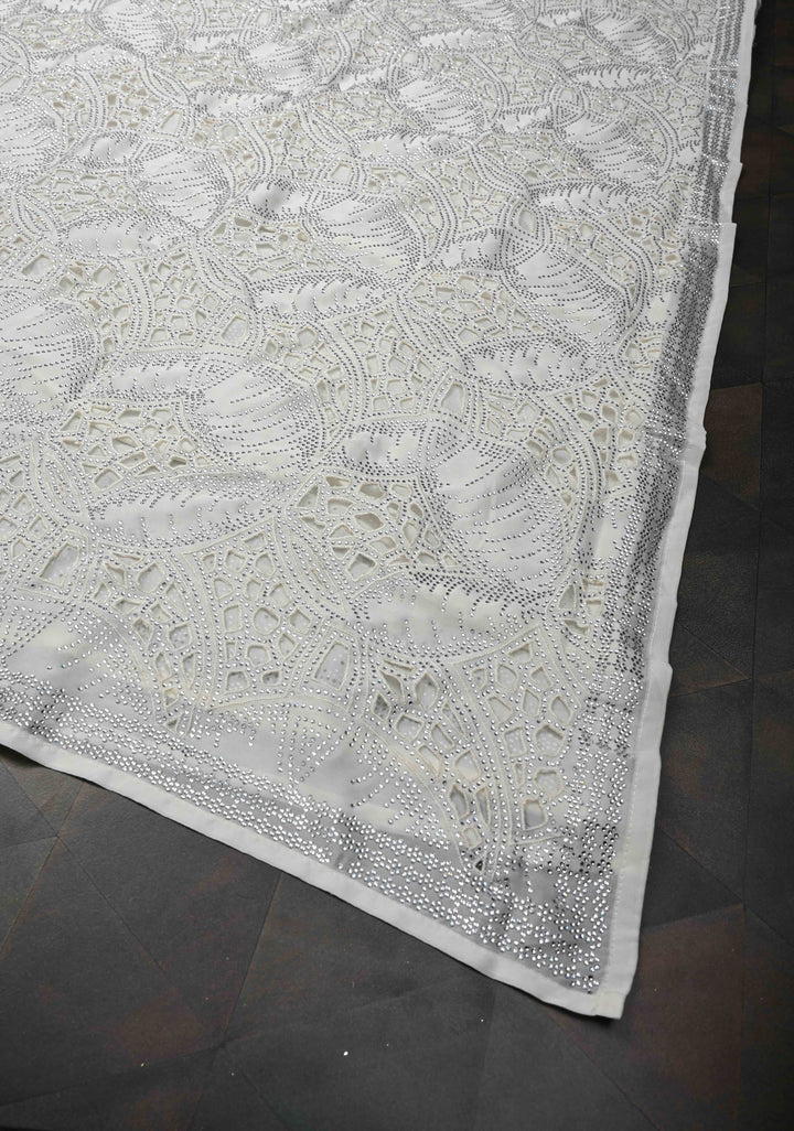 Ivory Satin Machine Cutwork Saree and Tone on Tone Powder Stones work