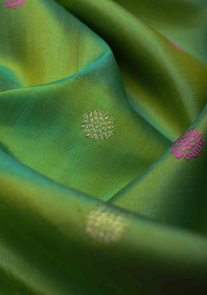 Pista Green Dual tone Pure Gadwal Silk Saree  with Meenakari Buttas and Contrast Silver Zari Border | SILK MARK CERTIFIED
