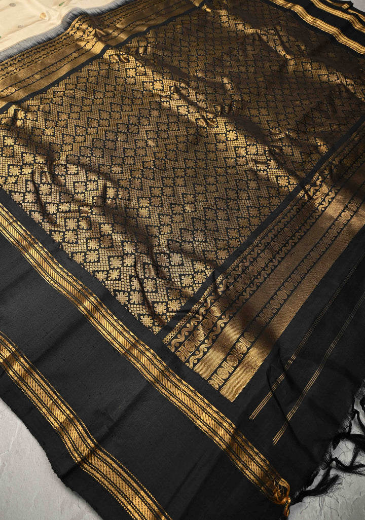 Beige Pure Gadwal Silk Saree with Meena Zari Buttas and Contrast Rettaipet Border | SILK MARK CERTIFIED