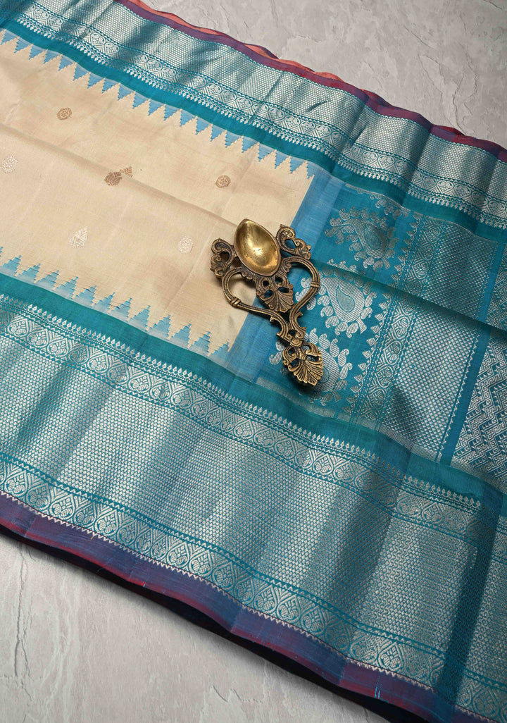 Beige Pure Gadwal Silk Saree with Gold-Silver Motifs and Contrast Blue and Silver Zari Border | SILK MARK CERTIFIED
