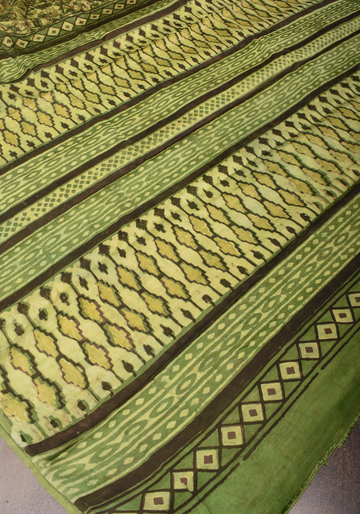 Vanaspati Hand Block Print on Modal Silk Saree in Moss Green with Kalamkari Border and Angoor latkans