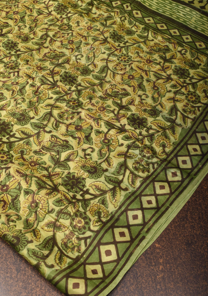 Vanaspati Hand Block Print on Modal Silk Saree in Moss Green with Kalamkari Border and Angoor latkans
