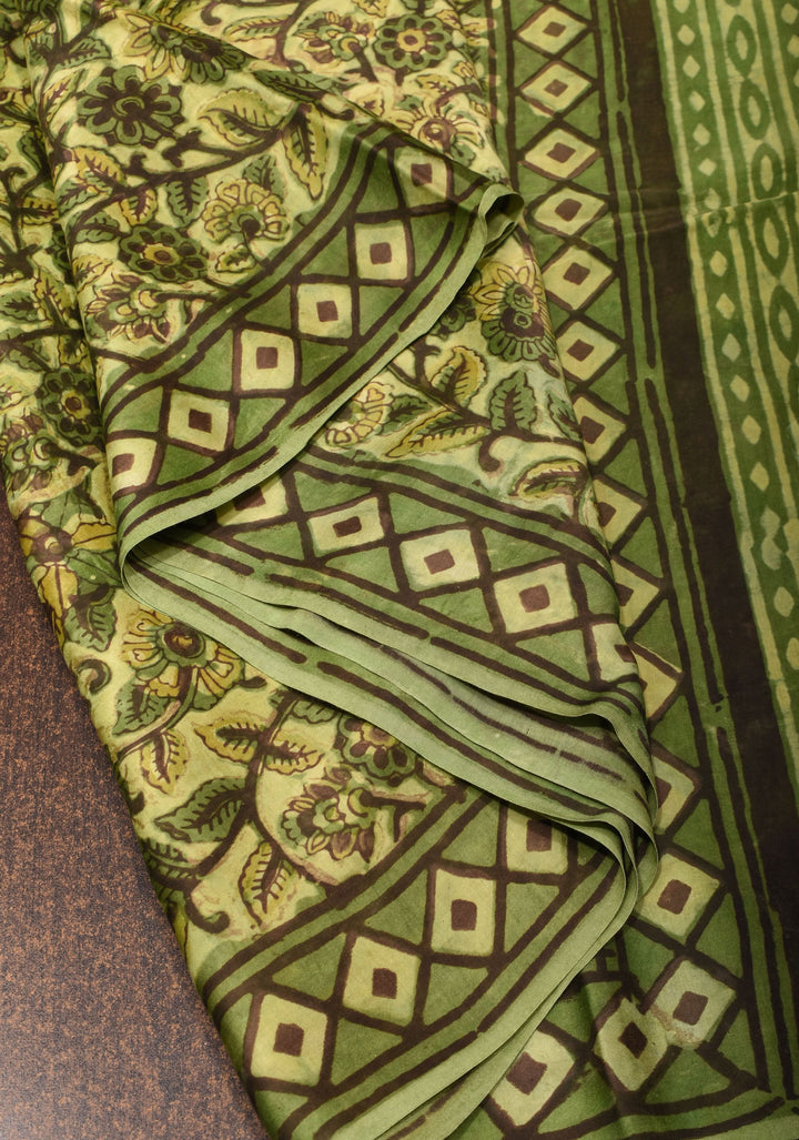 Vanaspati Hand Block Print on Modal Silk Saree in Moss Green with Kalamkari Border and Angoor latkans