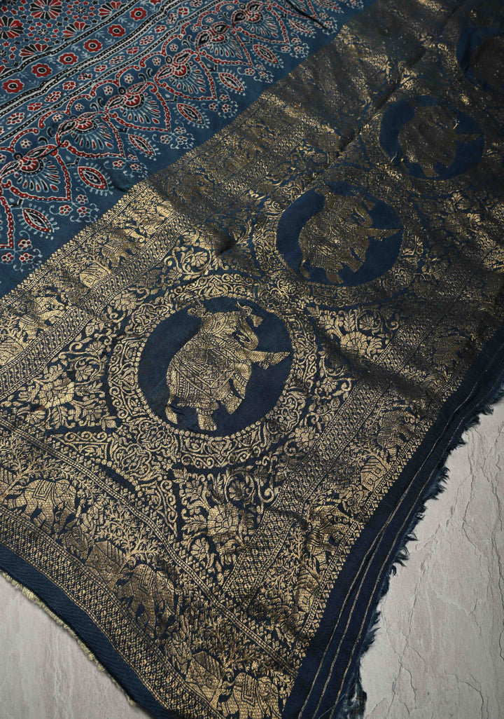 Indigo Ajrakh Hand Block Print on Dola Silk Saree with Fancy Zari Border and Elephant Motifs on Pallu